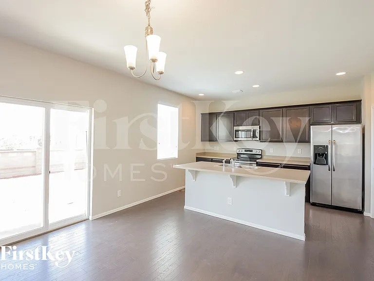 6481 N Dunkirk Ct — Photo 5