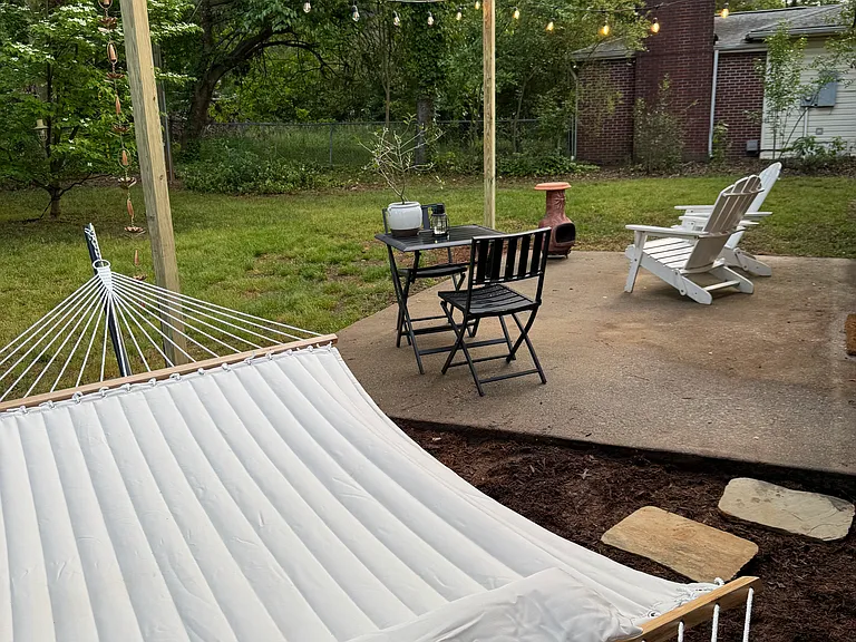 Backyard - outdoor living space with cafe lights