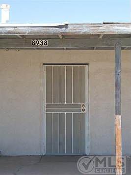 Front door shows 8938 for address - county records show 8936.