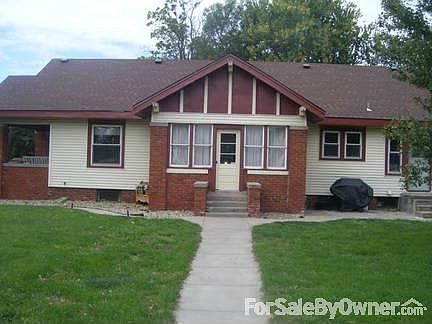 East Side of property
						:
						This property has great lawns on all sides, huge garden, and many mature trees.