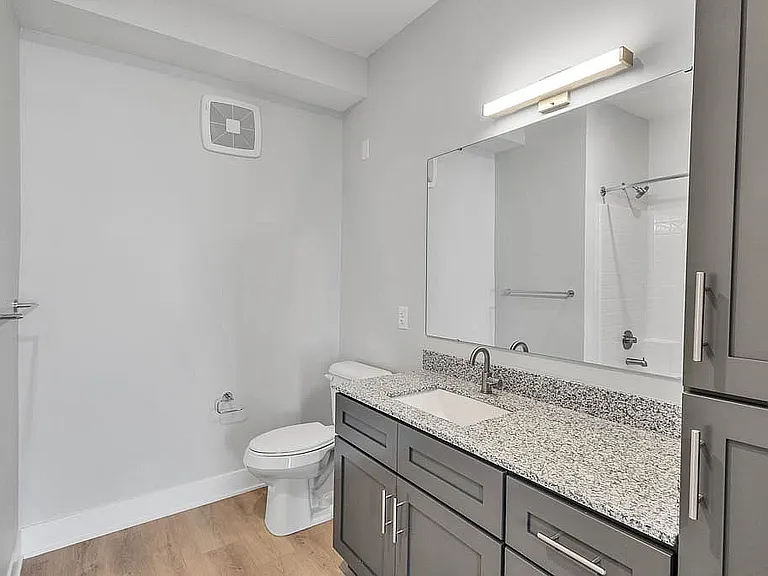 Elegant Bathroom with Granite Countertops