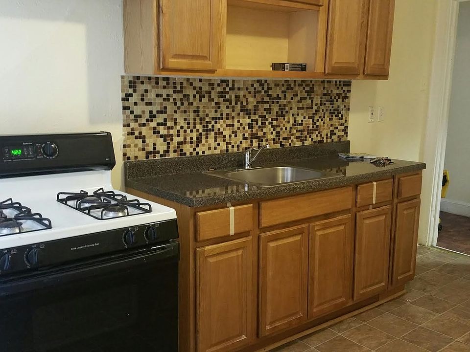 New Kitchen - All new floors, cabinets, countertop and back
