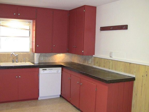 Lots of cabinets and counter space! Counters are concrete