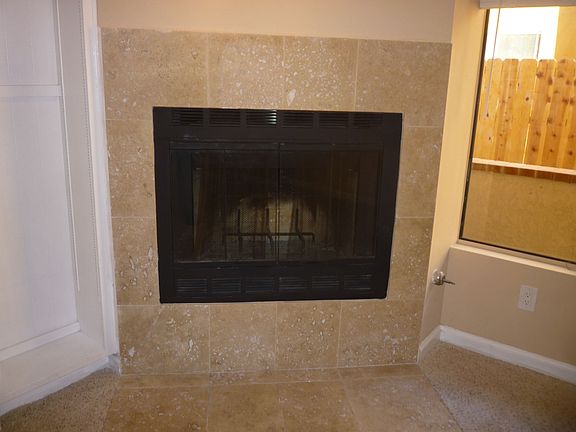 New travertine fireplace