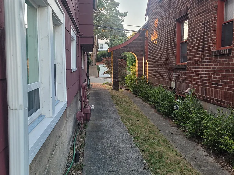 Sidewalk between the houses.
