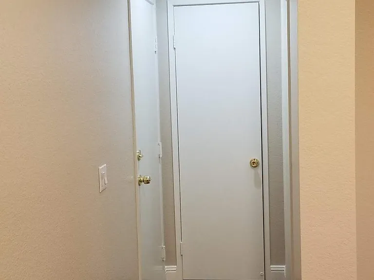 1st floor hallway leading to the garage
