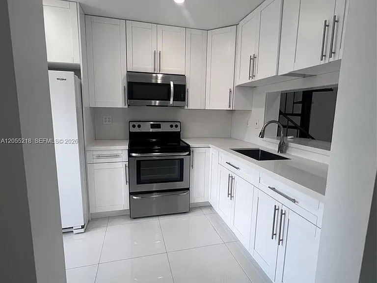 13056 SW 88th Ln #B206 — Photo 1