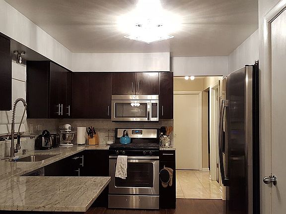 4th image of 4955 N Newland Ave