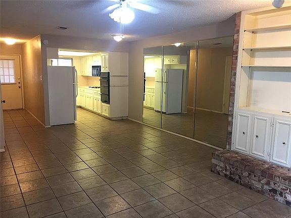 Large kitchen, Fridge, oven, microwave and plenty of cabinets for storage.