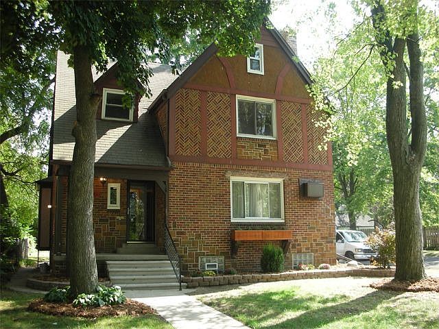 Great brick tudor in family focused neighborhood.