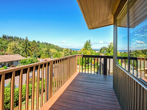 Enjoy peek-a-boo view of the lake on this deck!