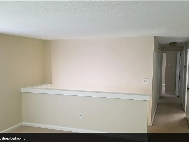 upper hall way leading to 3 upstairs bedrooms, with master on right at end of hall