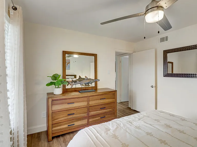 Cozy Bedroom with Wooden Accents _ Oak Park Apartments