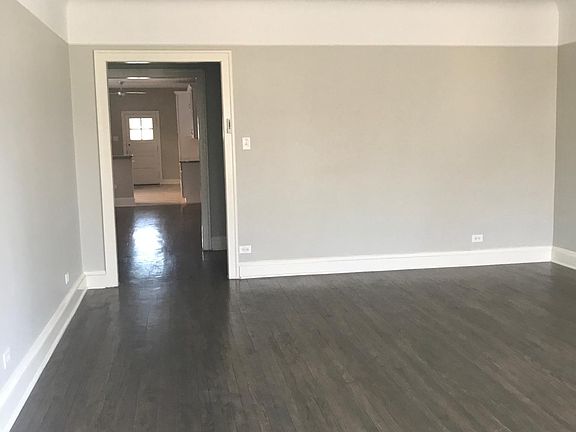 Living room looking toward kitchen