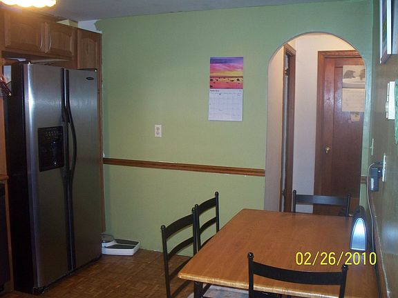newly repainted kitchen with all stainless appliances