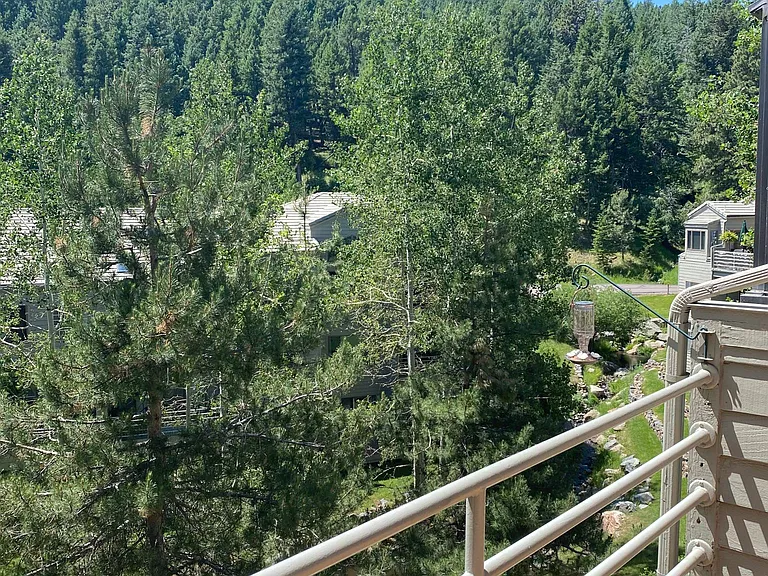 View from balcony with stream below.