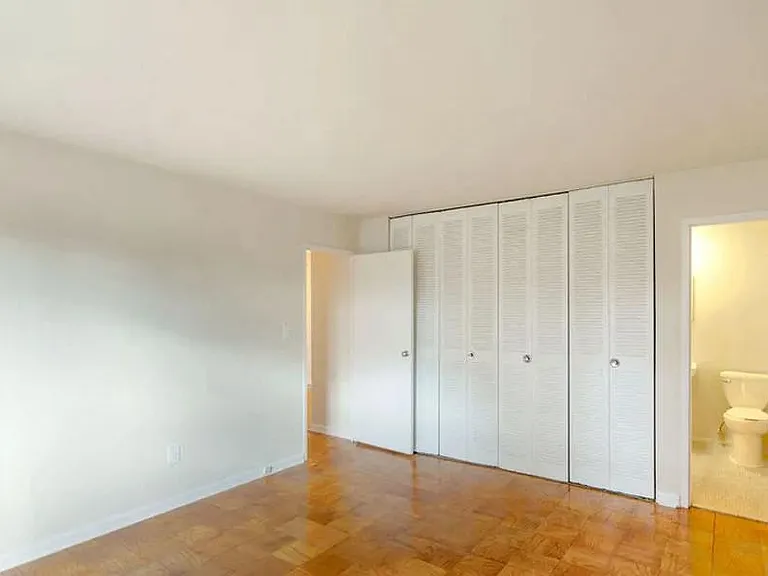 1B Master Bedroom and Closets
