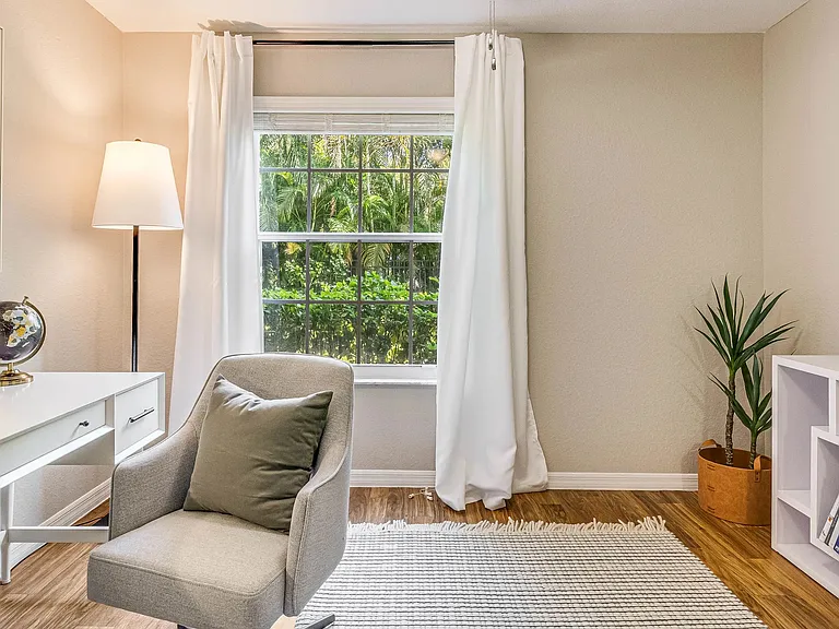 Each roomy bedroom graced with large windows for an abundance of natural light.