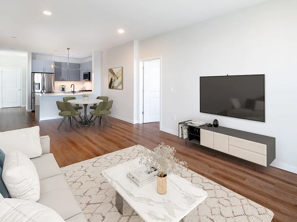 Signature Collection living room, dining area, and kitchen