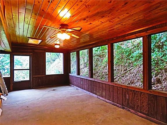 Enclosed Porch with Electricity.  Perfect for those Spring, Summer and Fall Evenings.