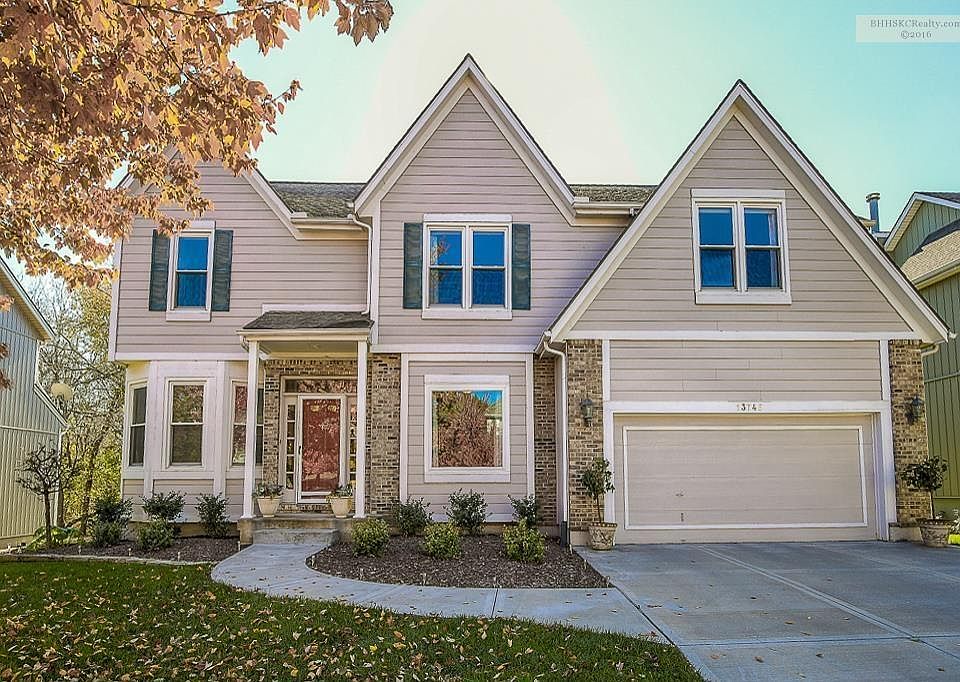 Great Curb Appeal and exterior is Hardie siding with brick trim