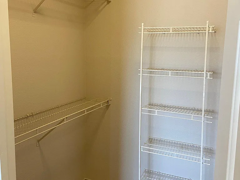 Two walk in closets off each bedroom