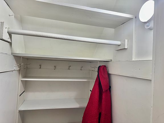 Auto light walk-in coat closet front hall