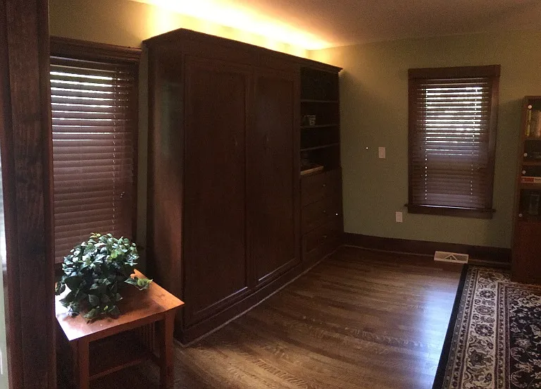 Murphy bed on wall. Double bed.
