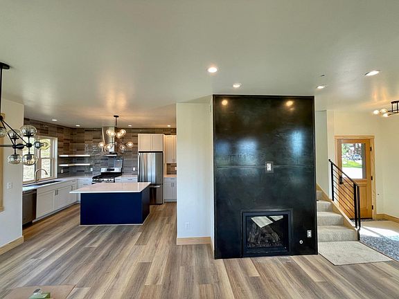 Open floorplan kitchen, dining, living room. Epic views every direction.
