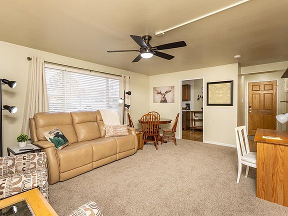 Very comfortable double electric reclining sofa, dining table, and ceiling fan with remote.