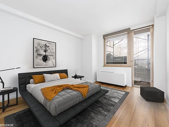 3rd image of 393 W 49th St APT 2HH