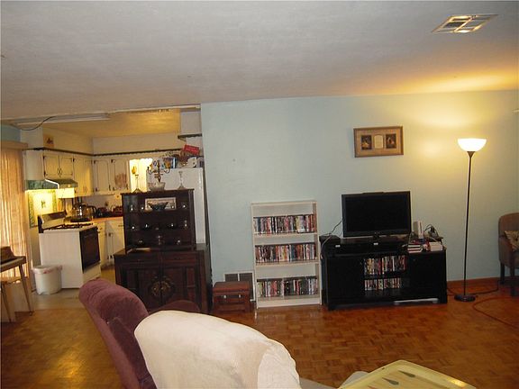 Another view of spacious LR open to kitchen