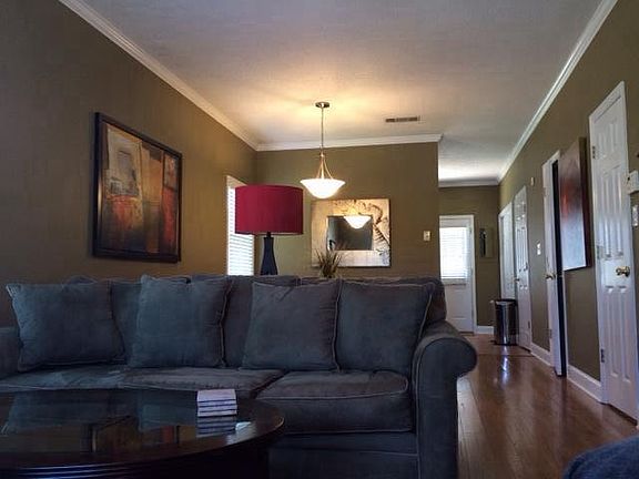 Tasteful furnishings and lighting throughout.