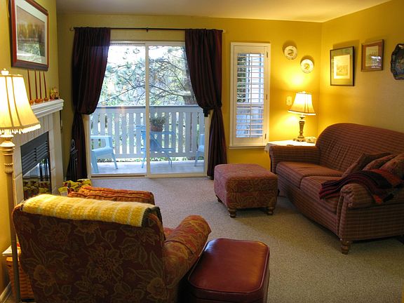 Cozy great room w/ wood burning fireplace