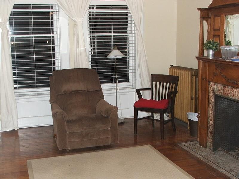 Front room with fireplace mantle