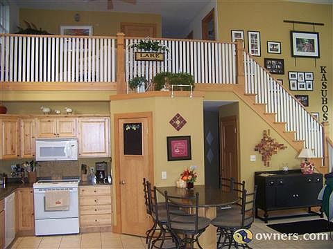 Open staircase that leads to 2 bedroom, full bath and bonus room