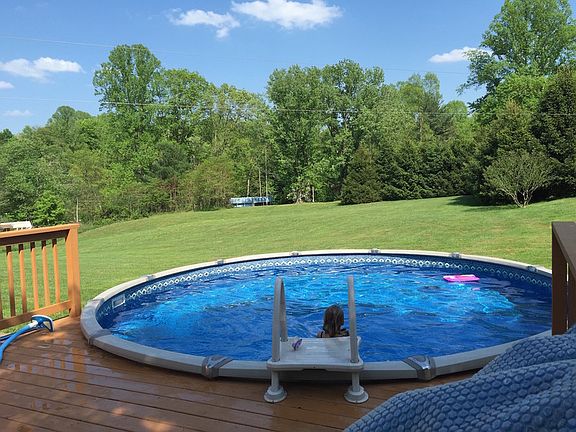 View of pool and some of the back yard