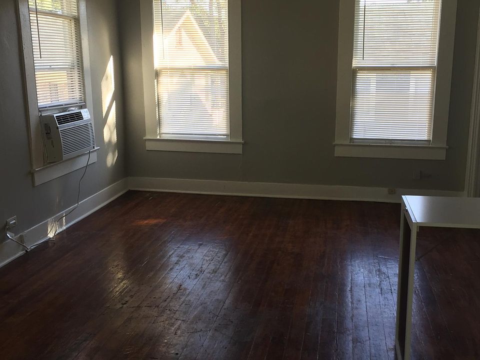 Living/sleeping combo with lots of natural light