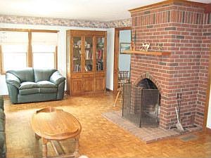LR w/other side of brick fireplace