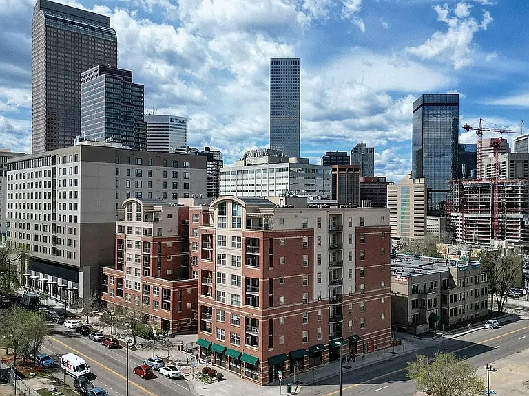 8-story concrete and brick building with amazing soundproofing between units. Convenience store with all essentials and snacks as well as attorneys office located in the building!