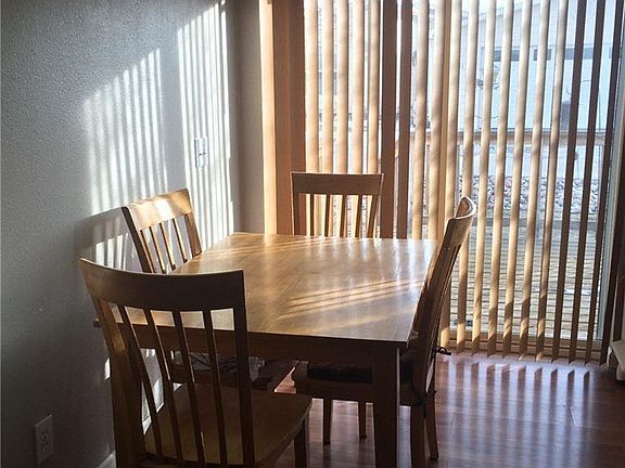 Informal dining area in kitchen.  Sliding door goes to large outside deck