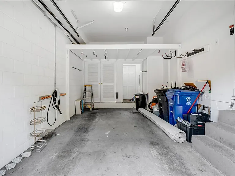 Spacious garage with electric charger