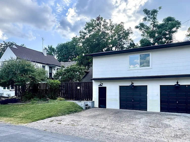 Detached garage spaces (2), along with driveway parking.