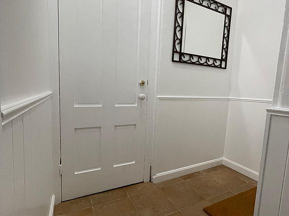 Landing for 2nd and 3rd floor units off side hallway.