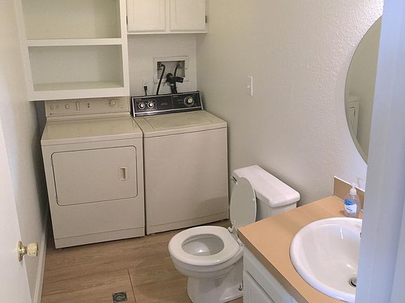 Downstairs half bath and laundry room