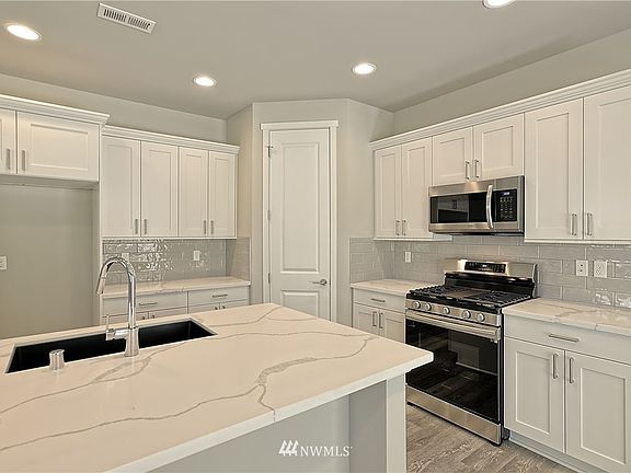 Photo is from another Huseby Homes community and may depict enhancements and features that are not available on all floor plans.