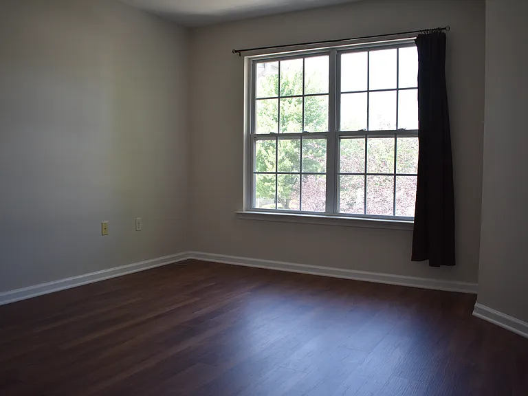 Guest Bedroom with attached Bathroom and Walk-In Closet