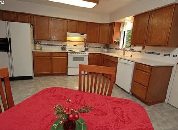large kitchen with instant hot water spout new quartz counters and new tile