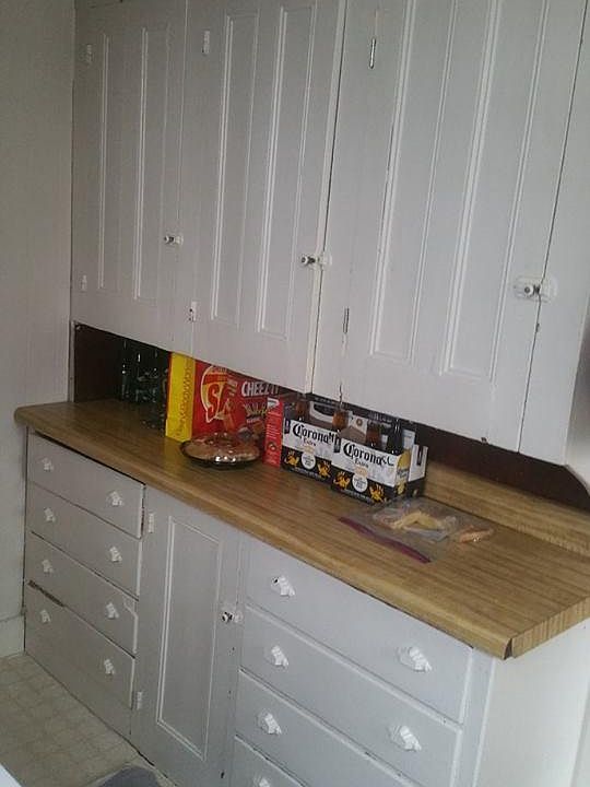Built in drawers and cabinets provide great storage in kitch