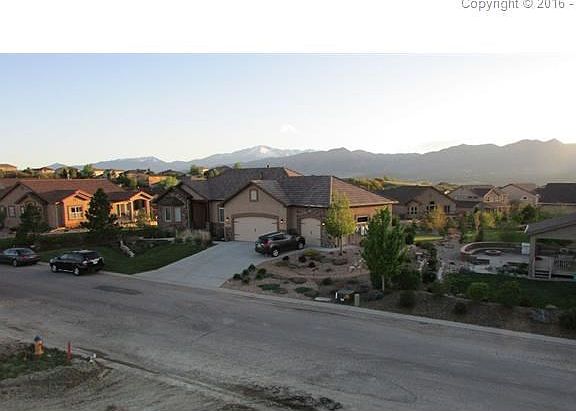 View from the front of the lot with Pikes Peak in background.